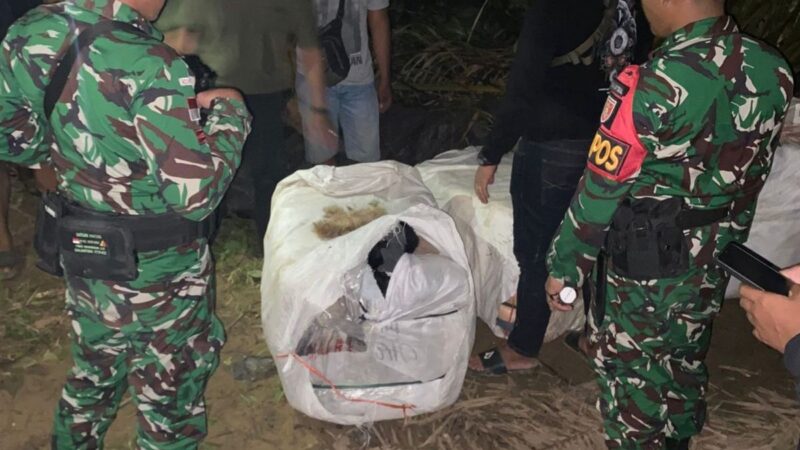 Judul: Satgas Pamtas RI-Malaysia Gagalkan Penyelundupan 5 Karung Balpres di Perkebunan Sawit Sebatik, Berkat Laporan Warga
